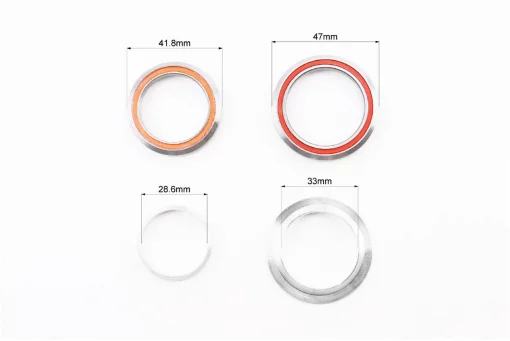 Рулевая колонка 1-1/8"х1-1/4" (41,8/28,6x47/33мм) безрезьбовой вилки, интегрированная, пром-подшипники, чёрная KL-B560,