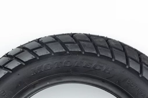 Шина 90/90-10 бескамерная, шипованная 9009, ШИНИ, YQ-353607